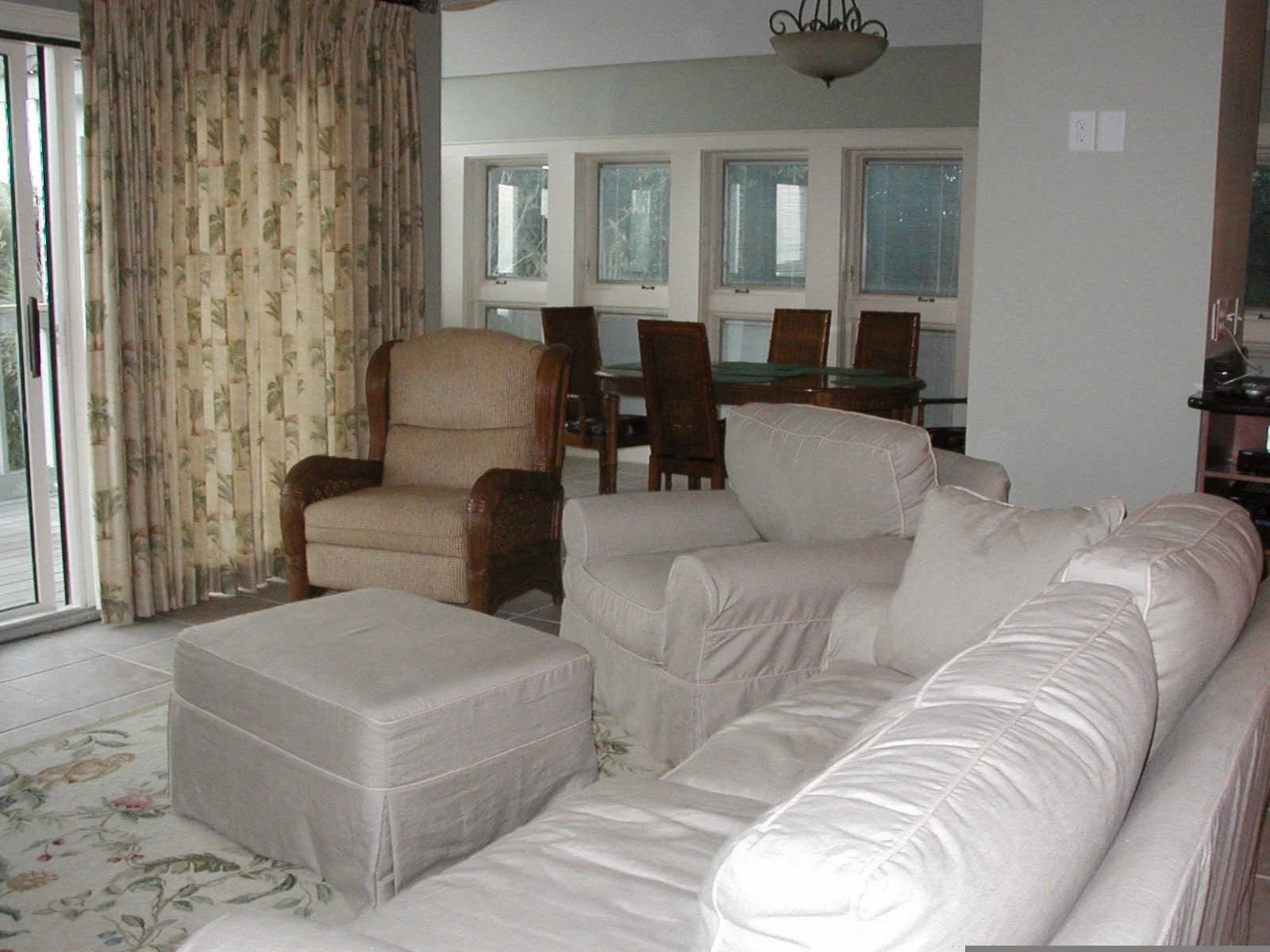 family room/dining/sitting area which over looks the ocean and deck.
